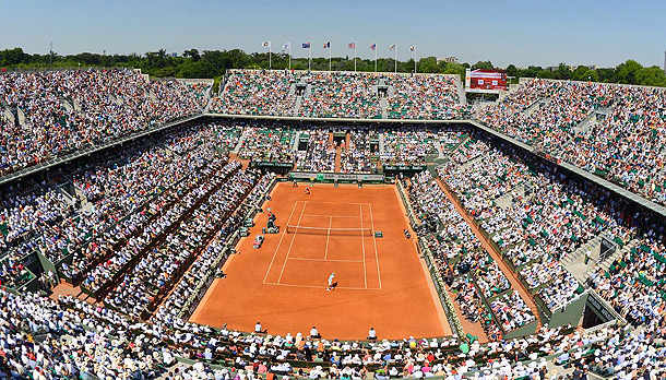 The clay courts at Roland Garros require quite a bit of maintenance throughout the French Open. (Bob Martin/SI)